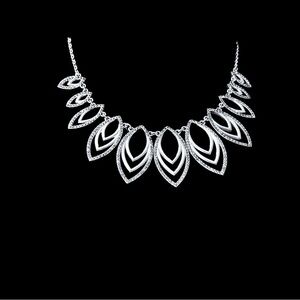 Brilliant Sparkling pavé-lined navette design sterling silver plate necklace.